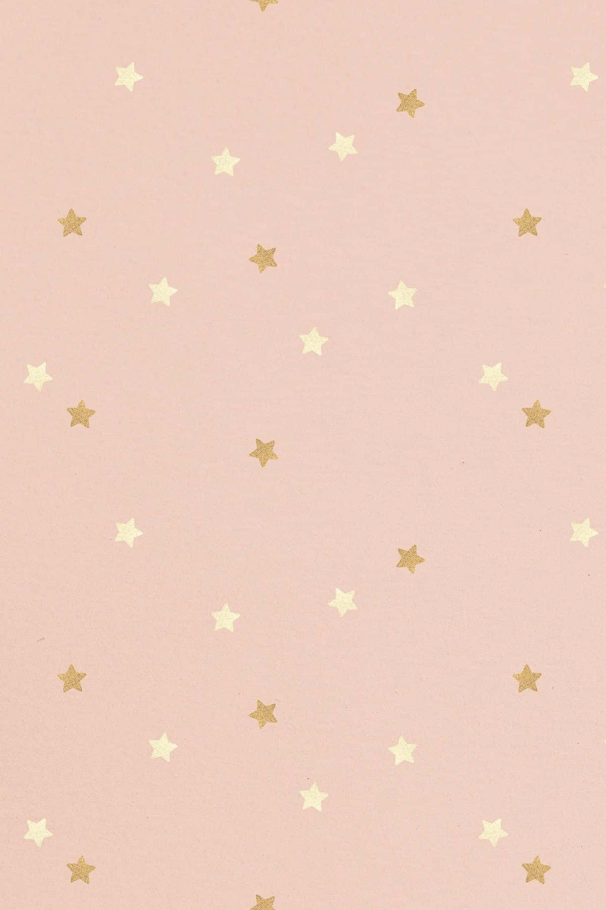 A Soothing Gradient Background Of Light Pink And Gold Wallpaper