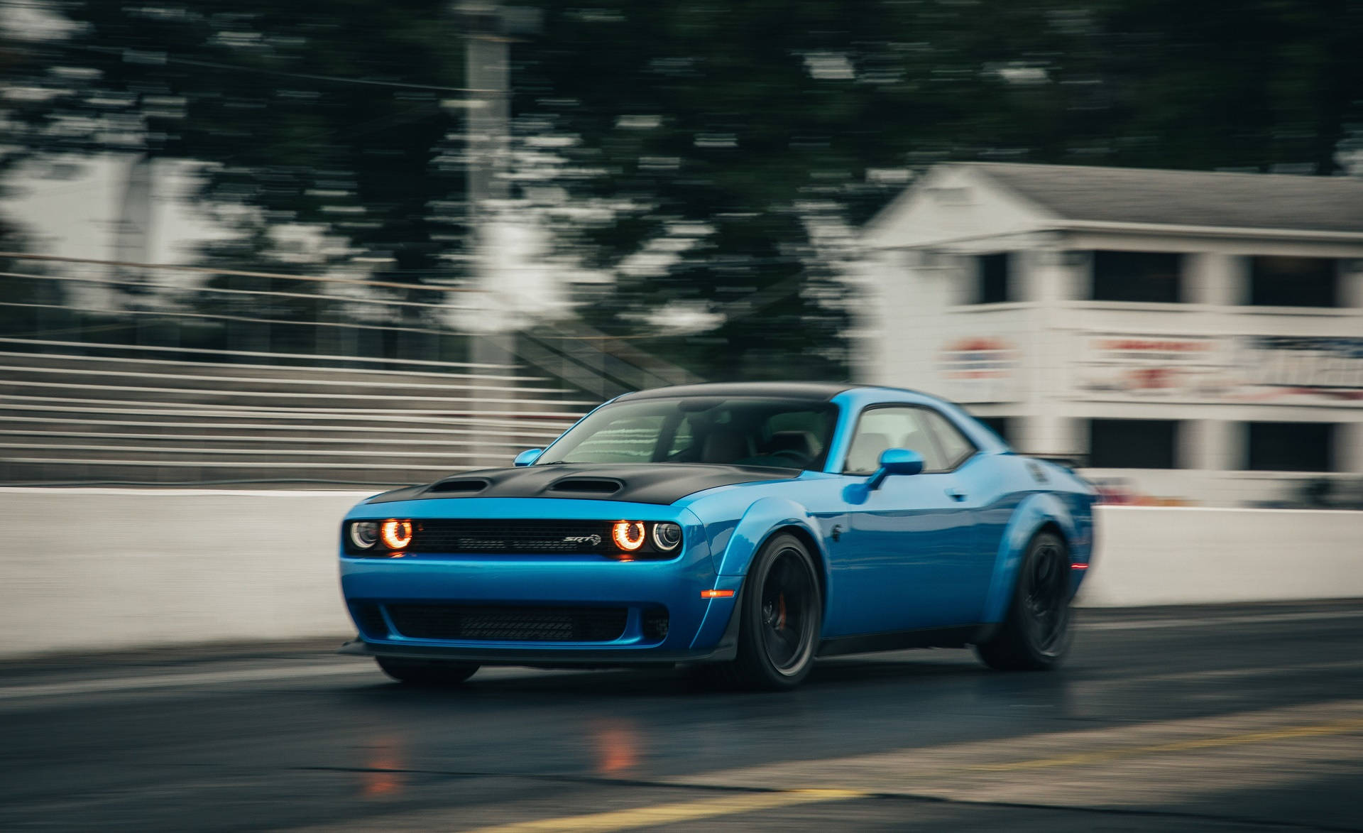 A Speeding Blue Dodge Challenger Wallpaper
