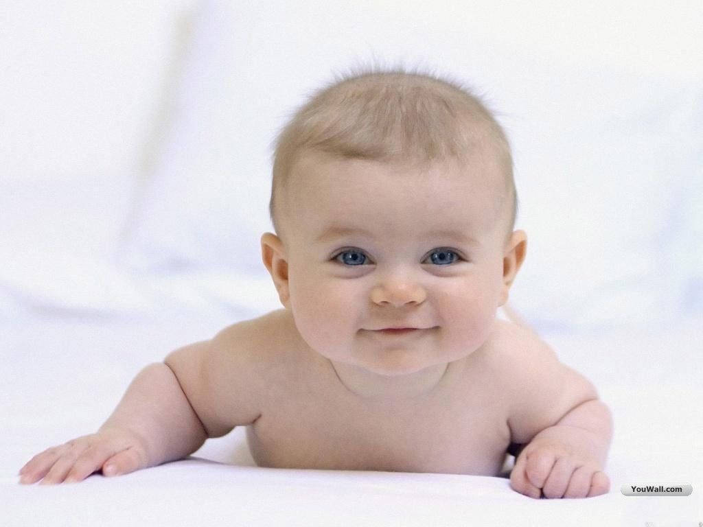 A Sweet Little Baby Boy In White Wallpaper