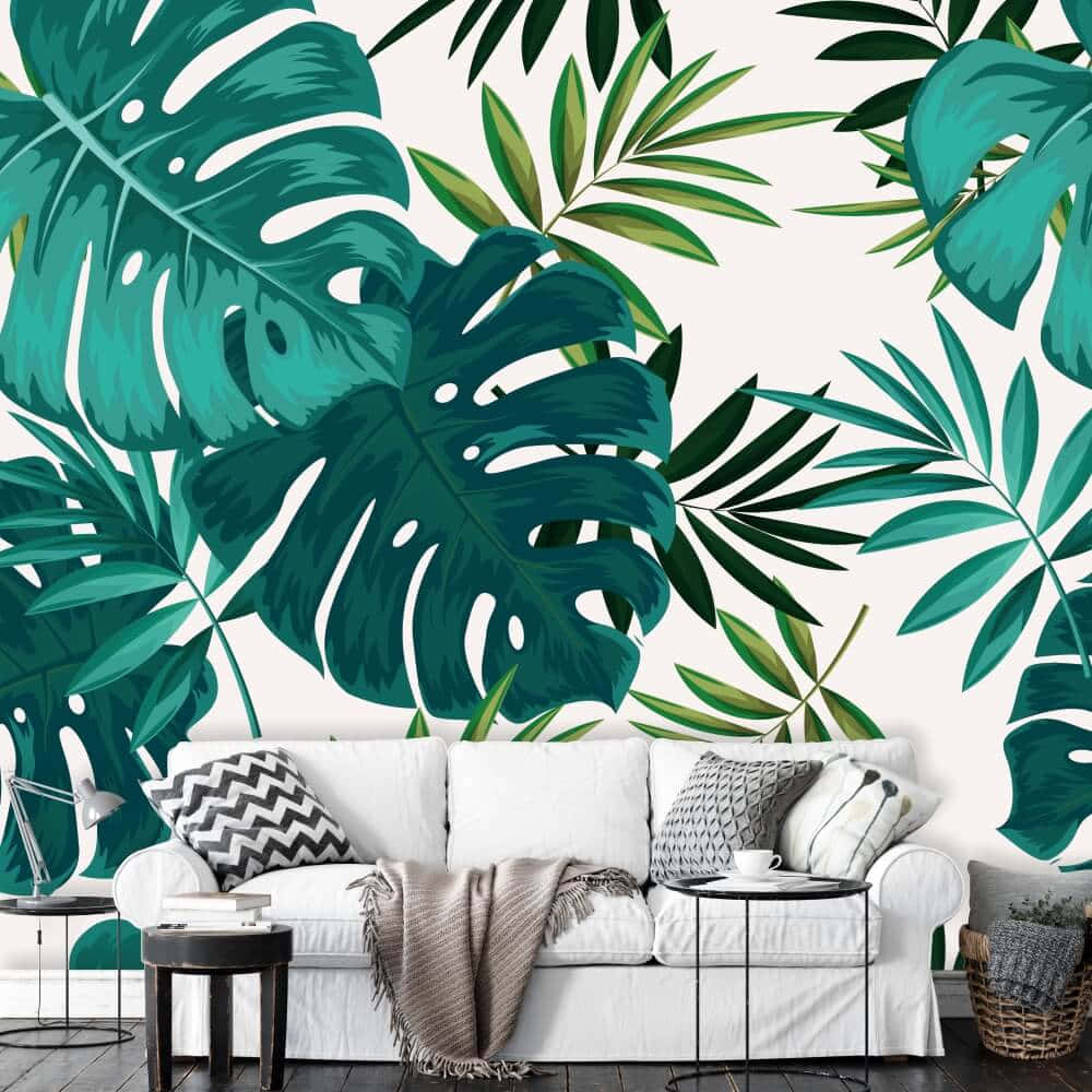 A Tranquil Tropical Living Room Featuring A Vibrant Monstera Leaf. Wallpaper