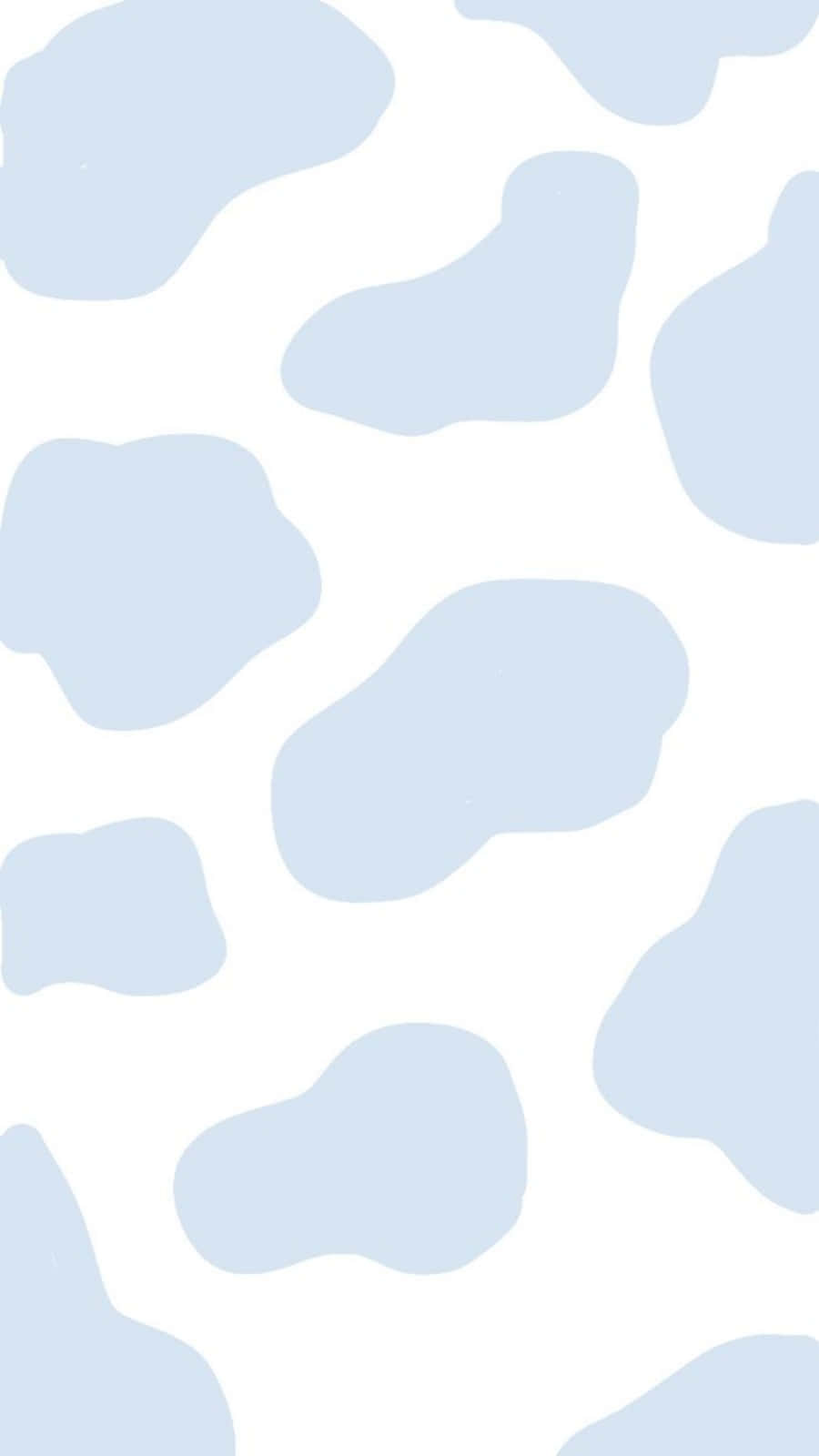 A White Cow With Blue Spots – Welcoming And Whimsical Wallpaper