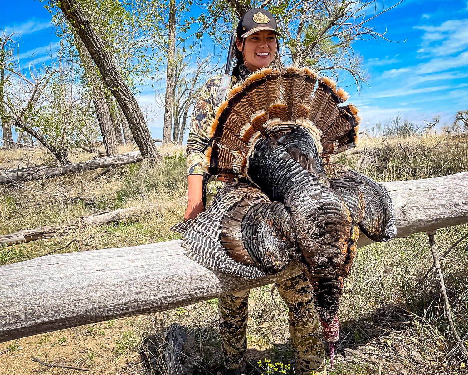 A Woman Holding A Turkey Wallpaper