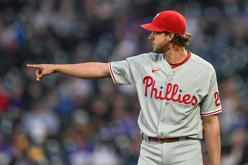 Aaron Nola, A Star Player, Pointing To Victory Wallpaper