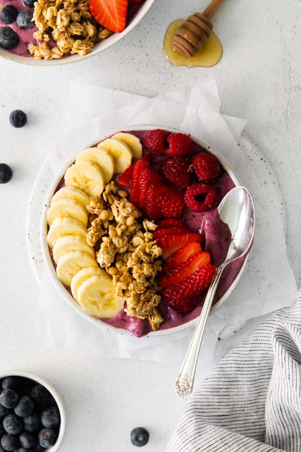 Acai Bowlwith Fruitand Granola Wallpaper