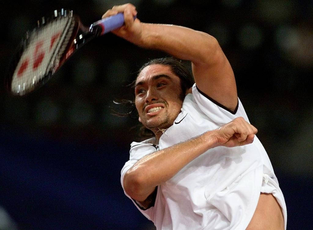 Acclaimed Tennis Player Marcelo Rios In Action Wallpaper