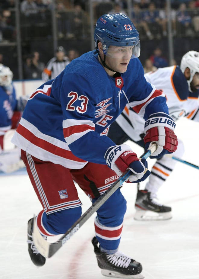 Adam Fox Blue New York Rangers Number 23 Wallpaper