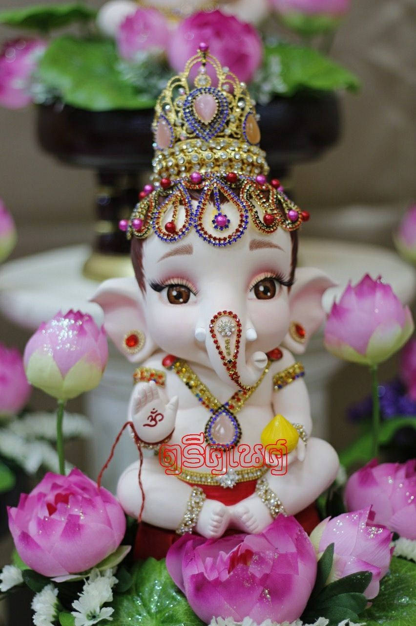 Adorable Baby Ganesha - The Divine Charm Wallpaper