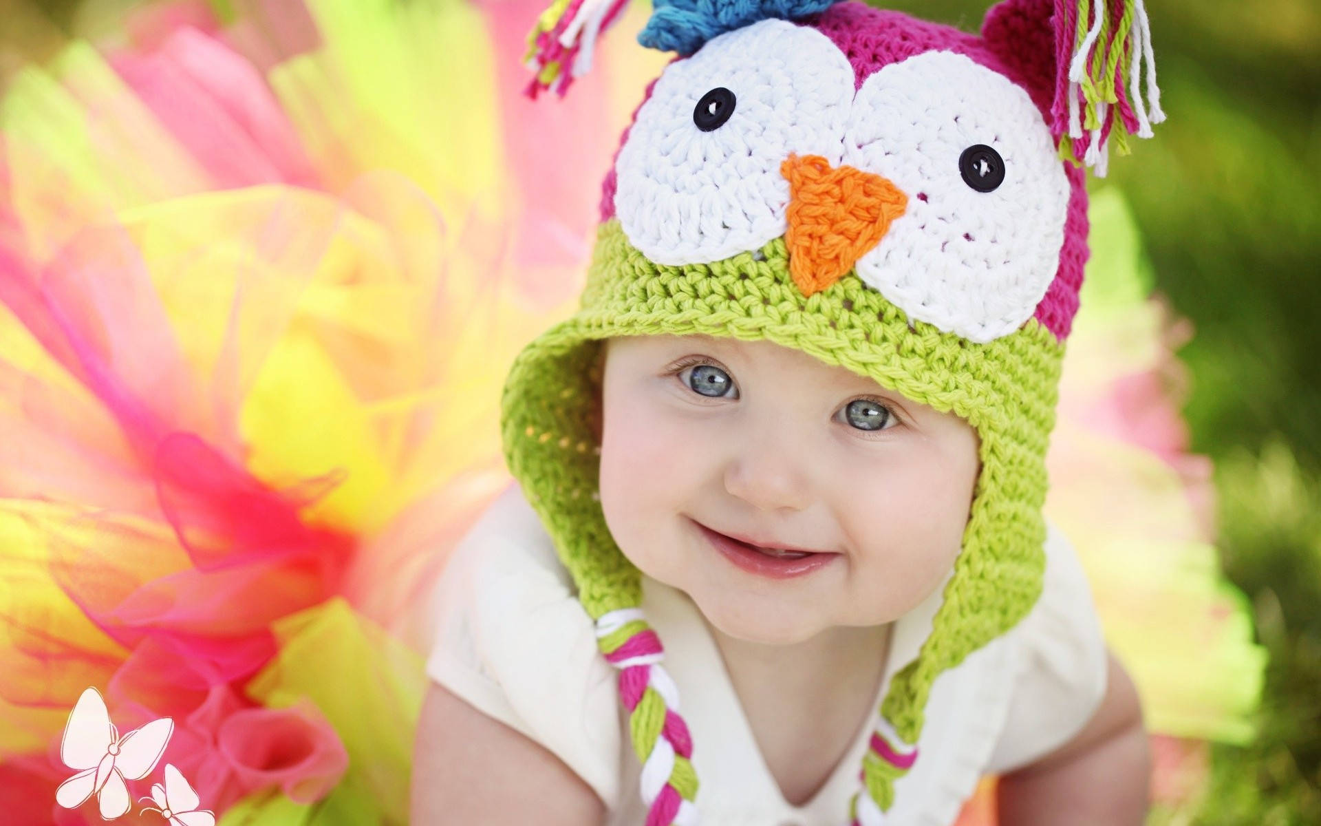 Adorable Crocheted Owl Embracing Baby Love Wallpaper