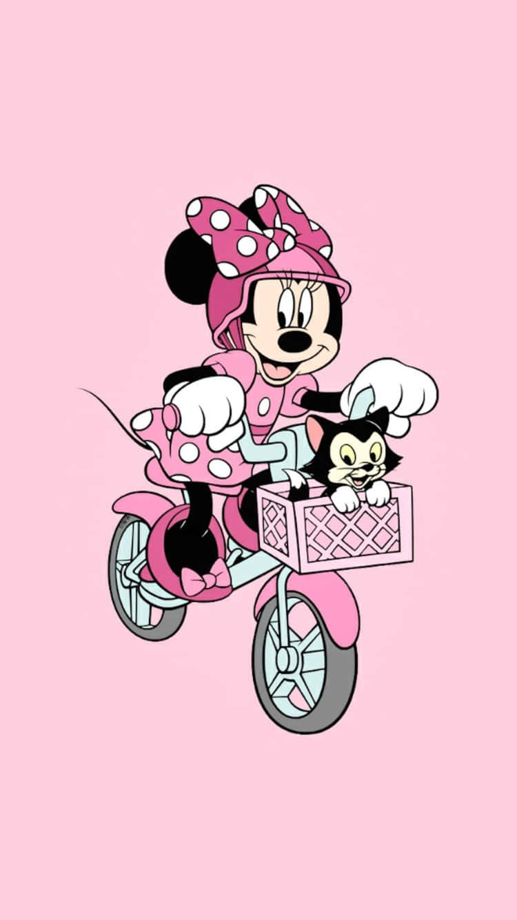 Adorable Minnie Mouse Enjoying A Day Out In Her Pink Bow! Wallpaper