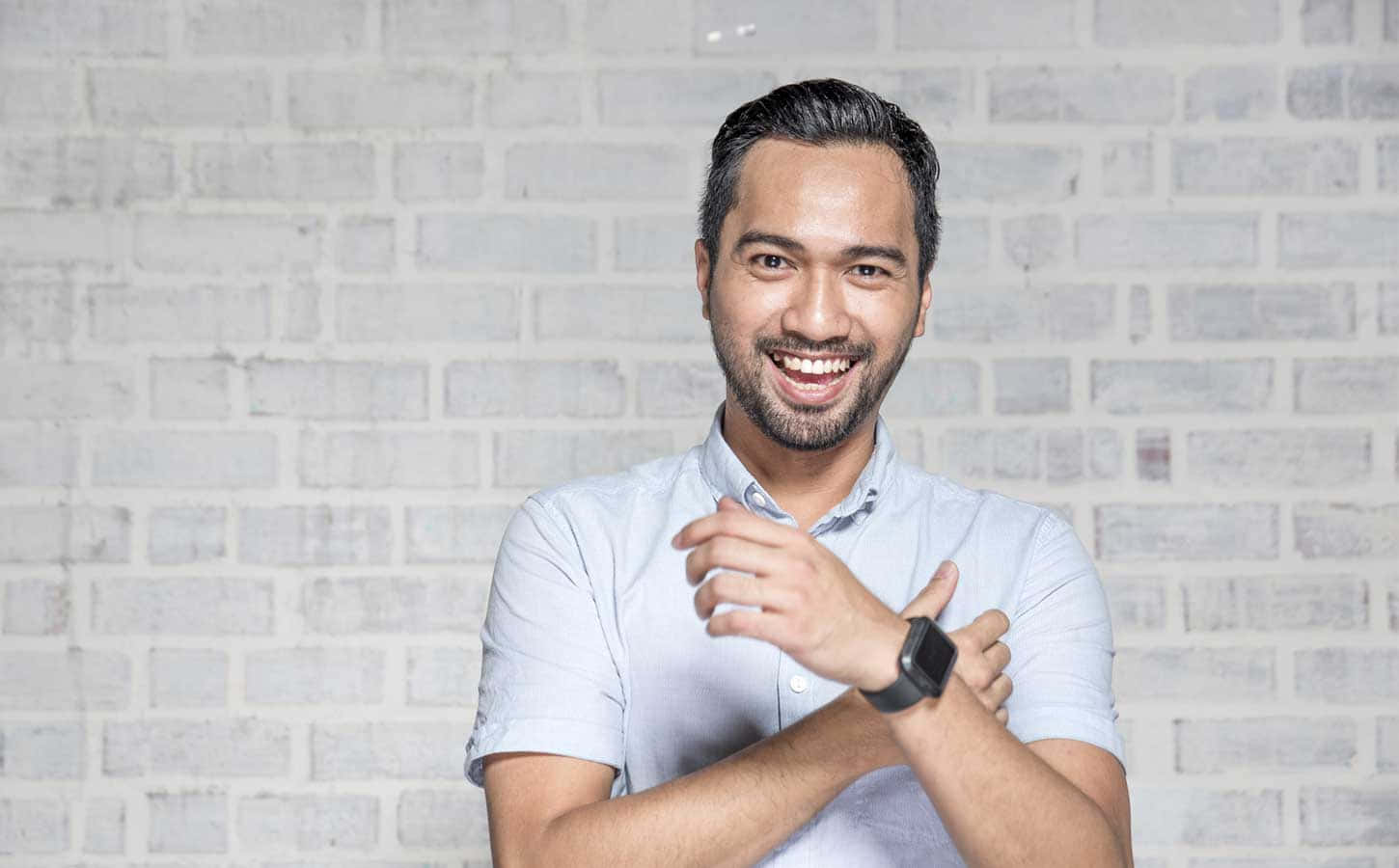 Adult Man Wearing Smartwatch Wallpaper
