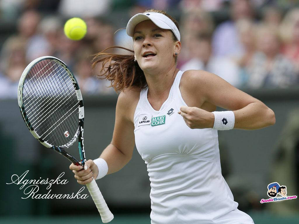 Agnieszka Radwanska Celebrating A Victory With A Fist Pump Wallpaper