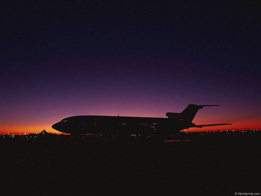 Airplane At Sunset Wallpaper