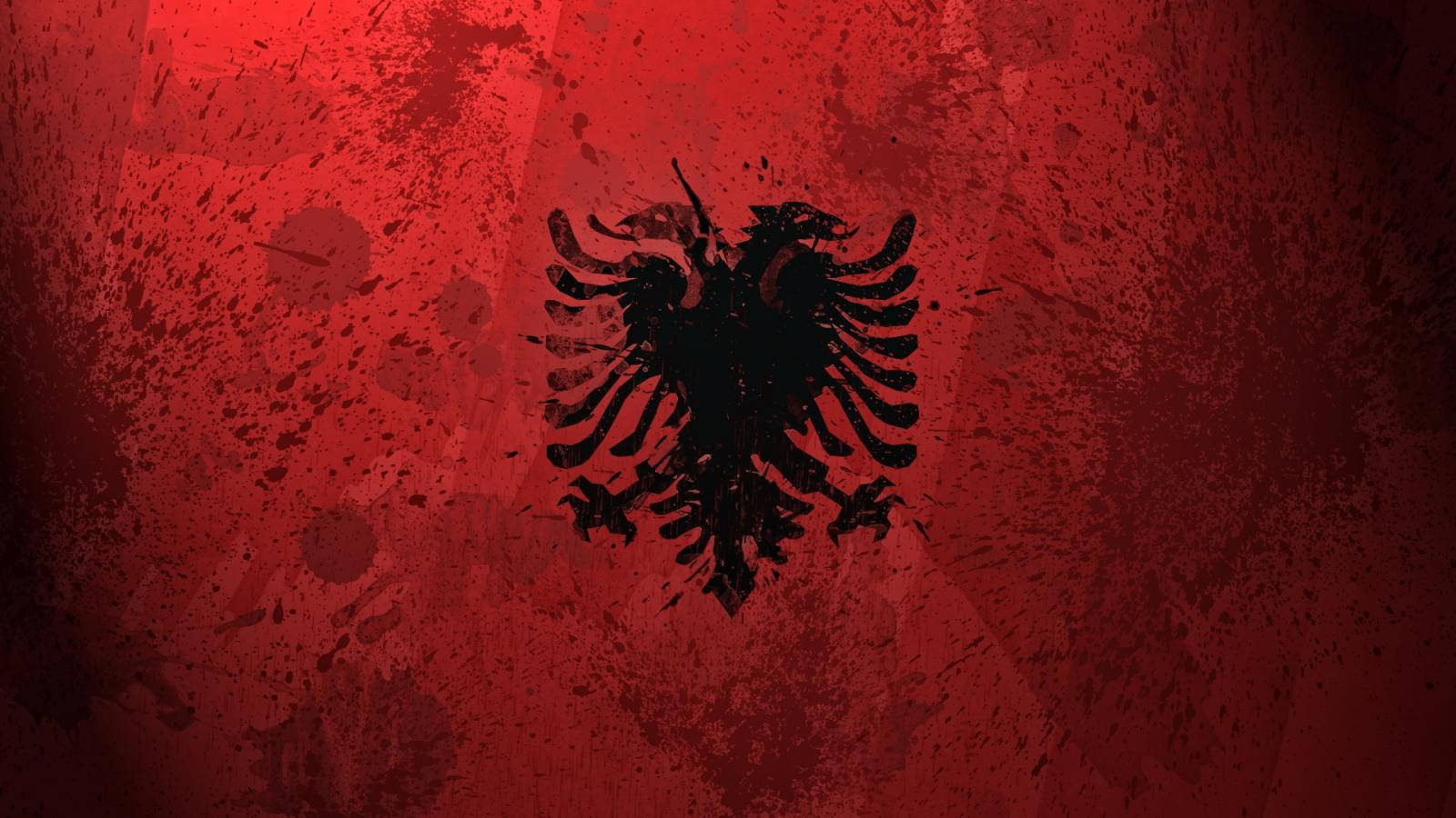 Albania Flag Paint Splatters Wallpaper