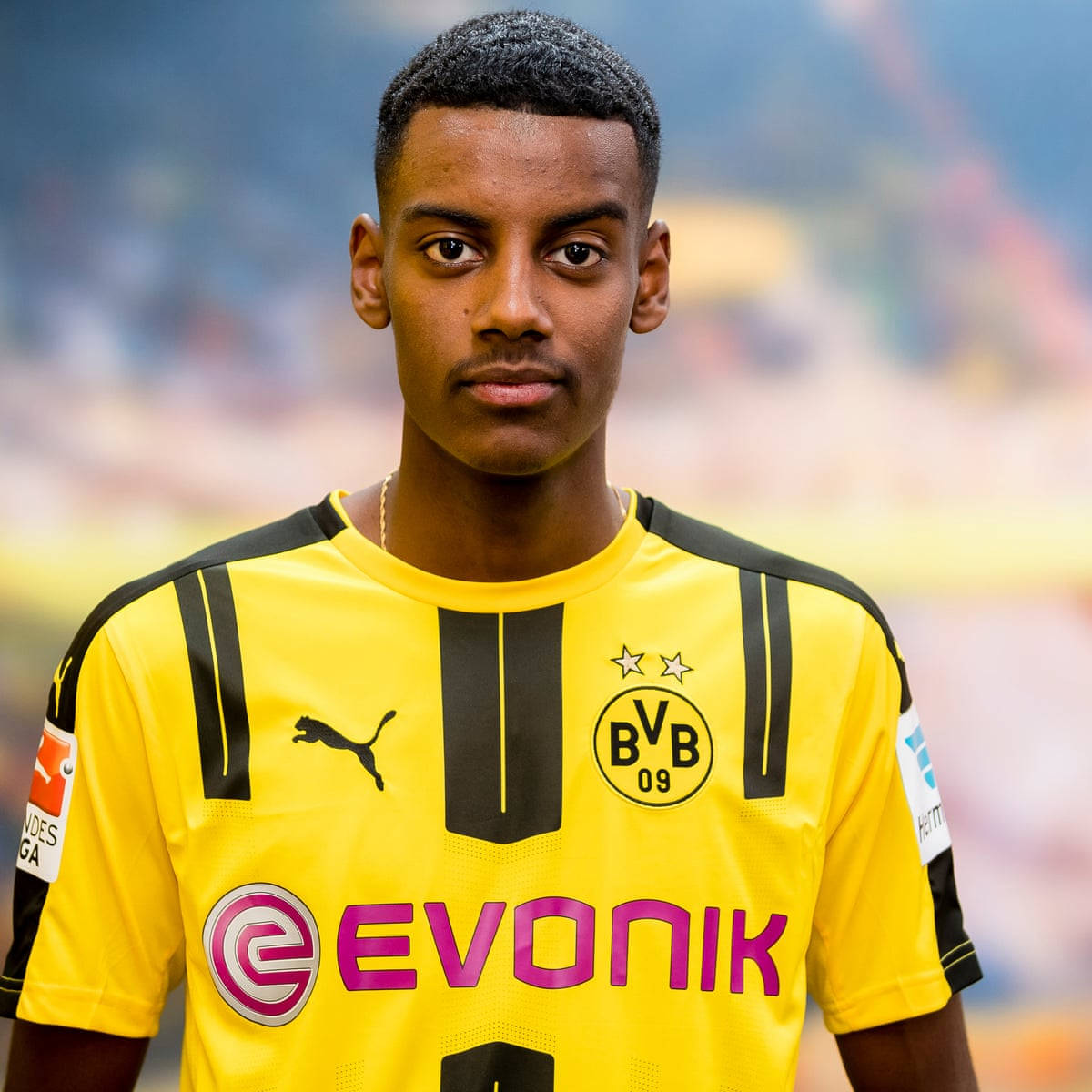 Alexander Isak Yellow Jersey Portrait Wallpaper