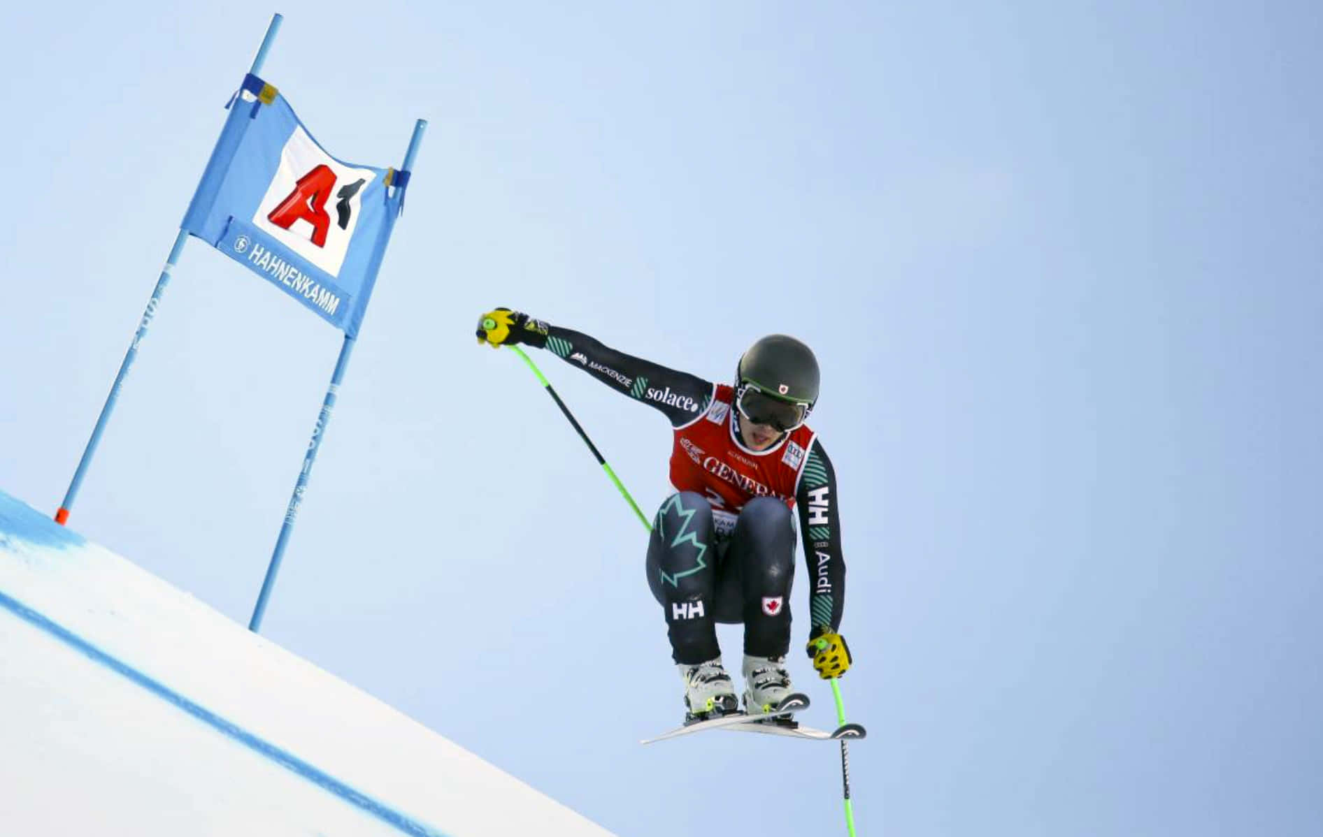 Alpine Ski Racer In Action Wallpaper