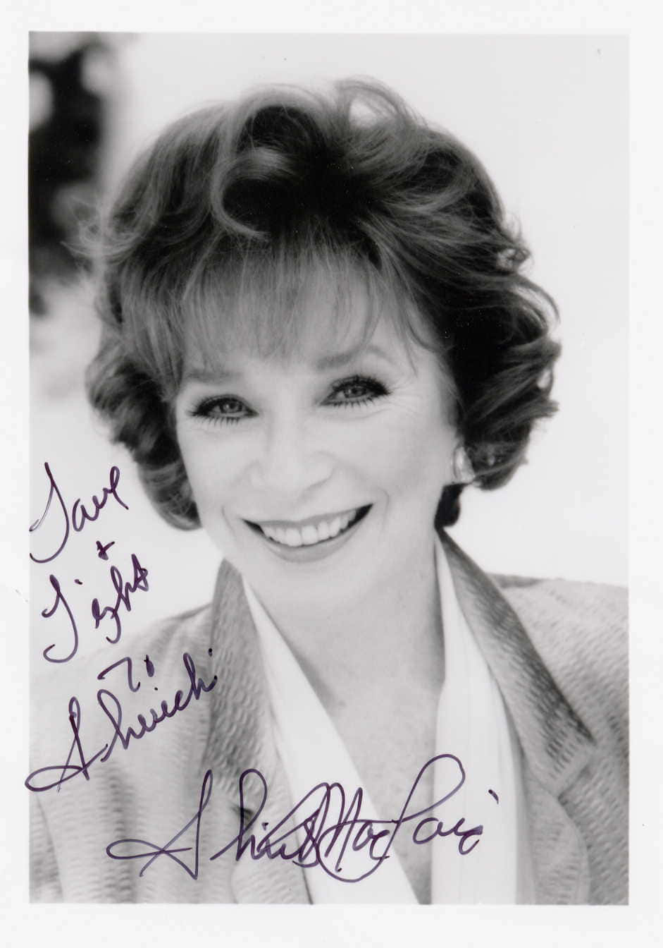 An Autographed Image Of Shirley Maclaine Wallpaper