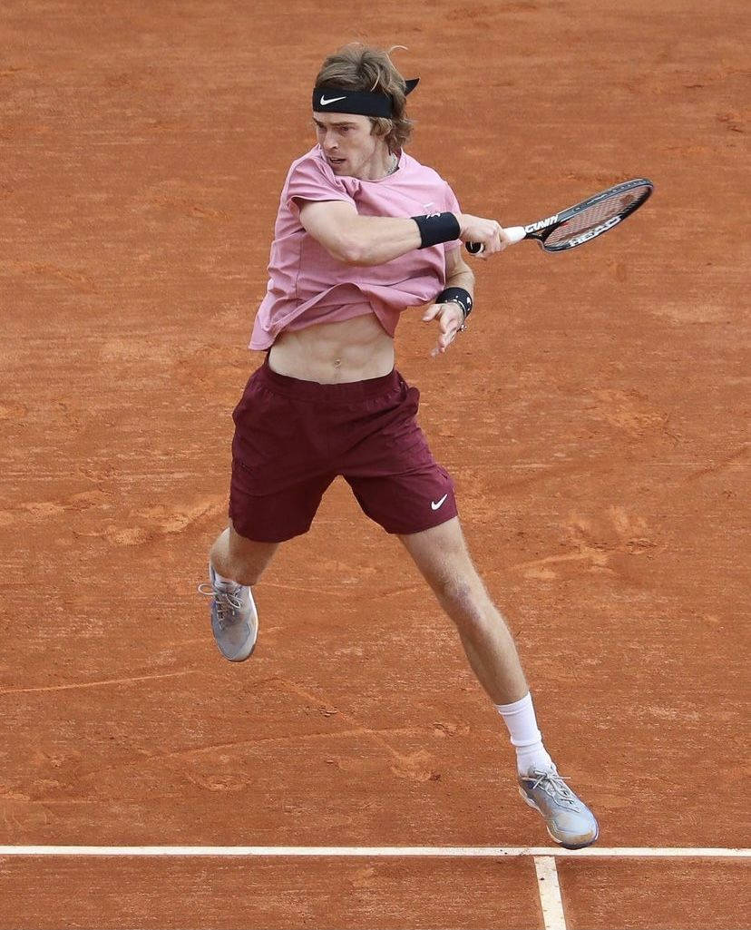 Andrey Rublev In Action During A Tennis Match Wallpaper