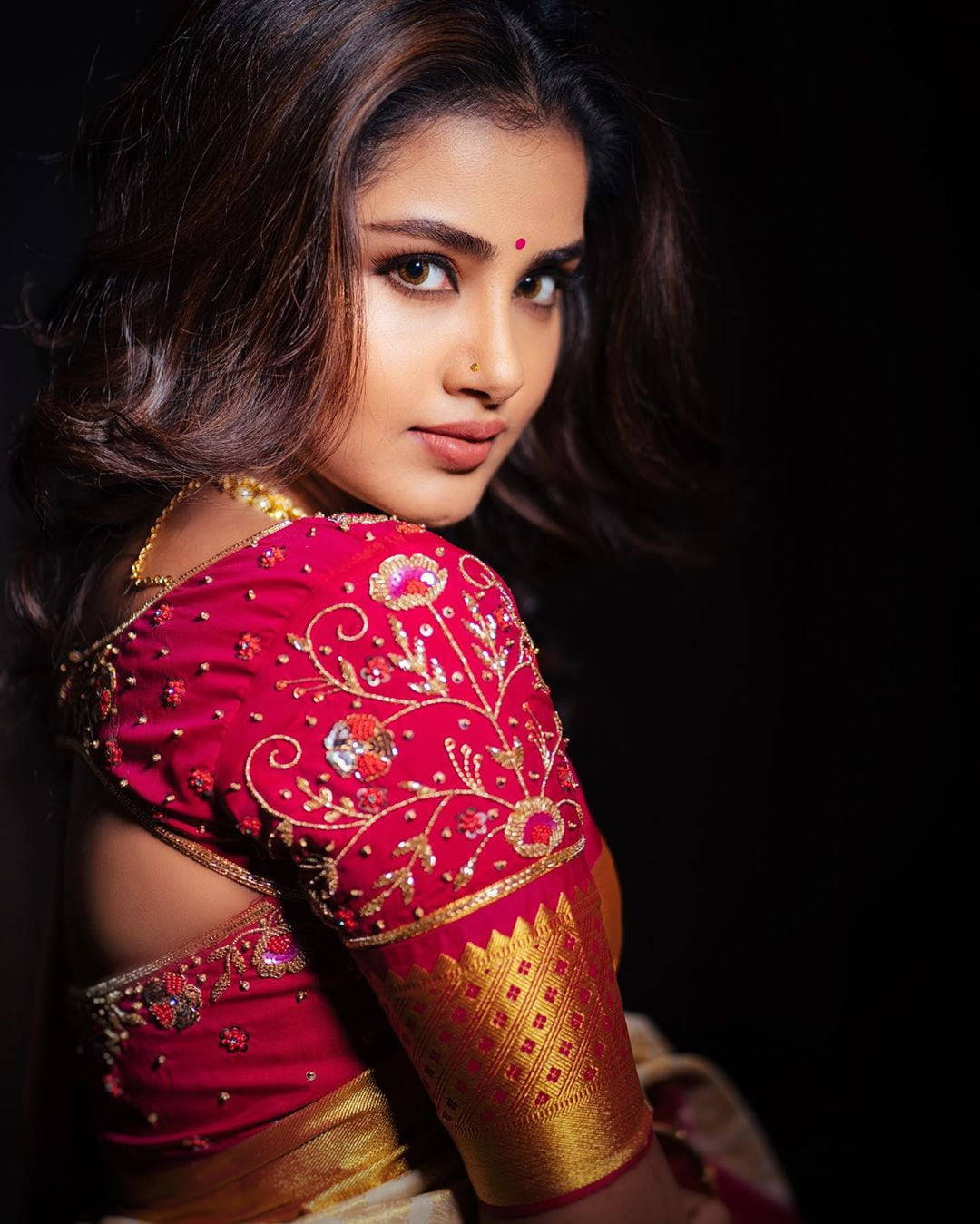 Anupama Parameswara Red Gown Wallpaper