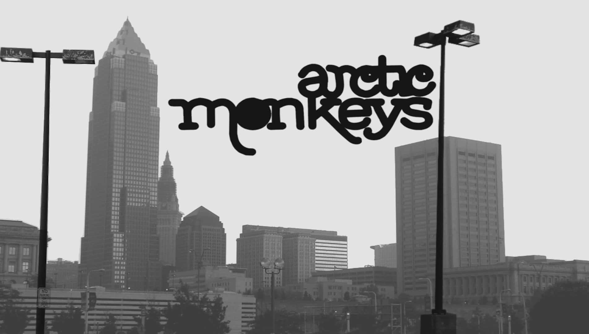 Arctic Monkeys Cityscape Logo Wallpaper