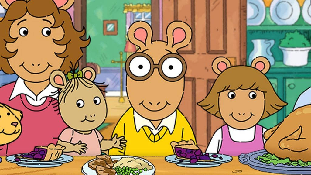 Arthur Enjoying Mealtime Fun With His Family Wallpaper