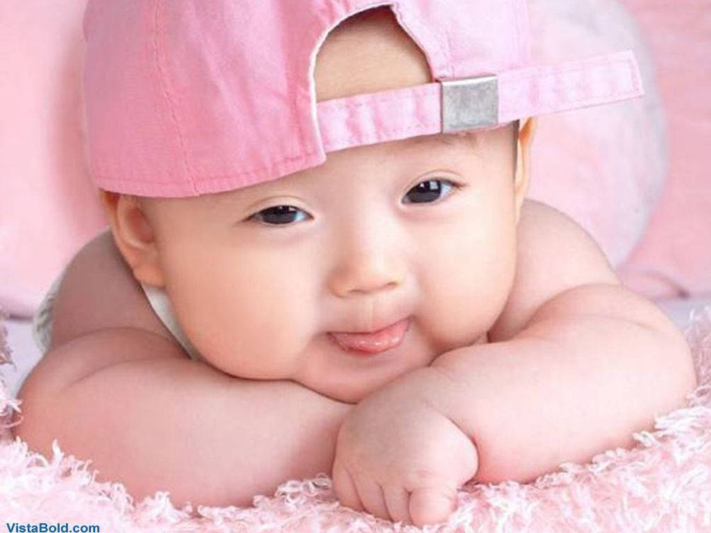 Asian Baby Wearing Pink Cap Wallpaper