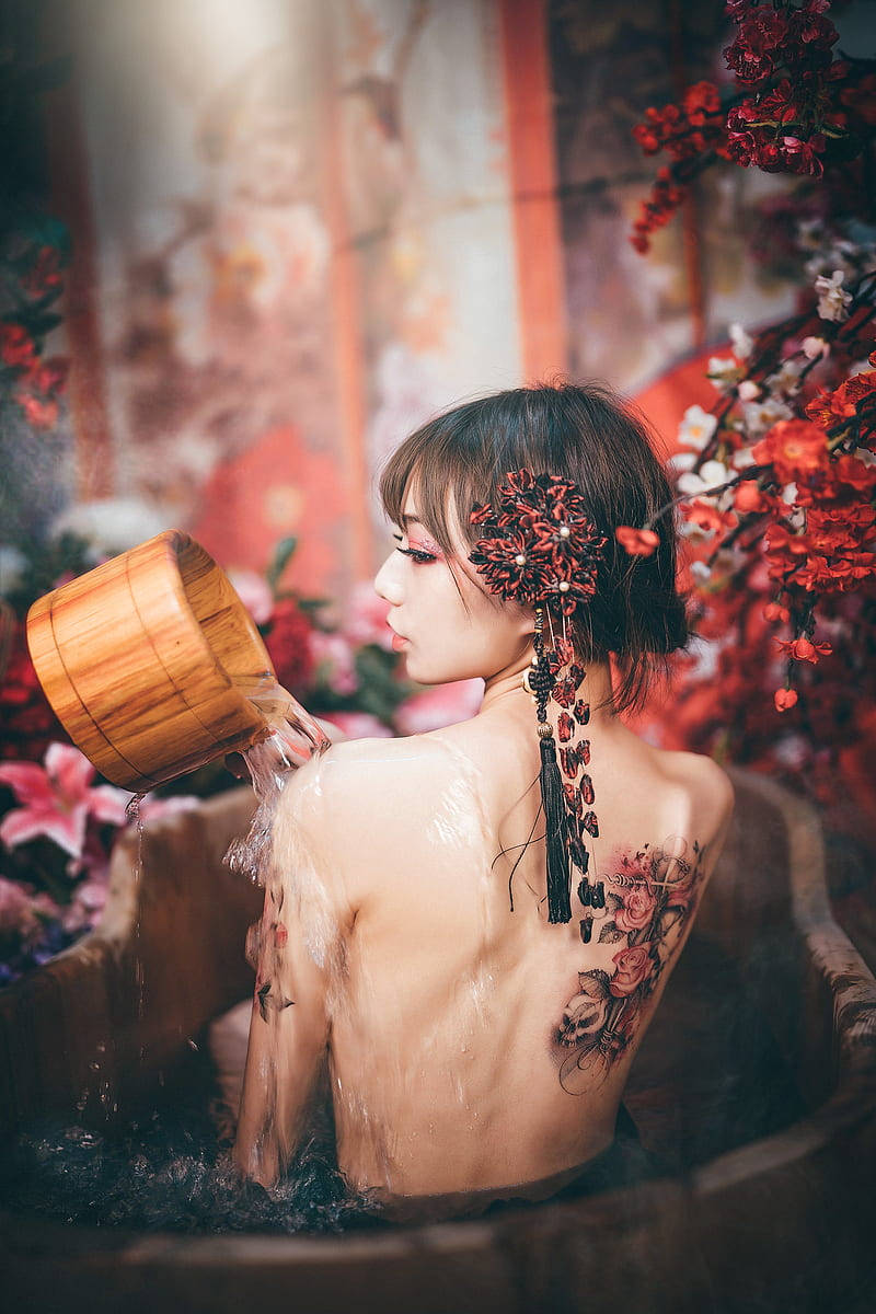 Asian Women Taking A Bath Wallpaper