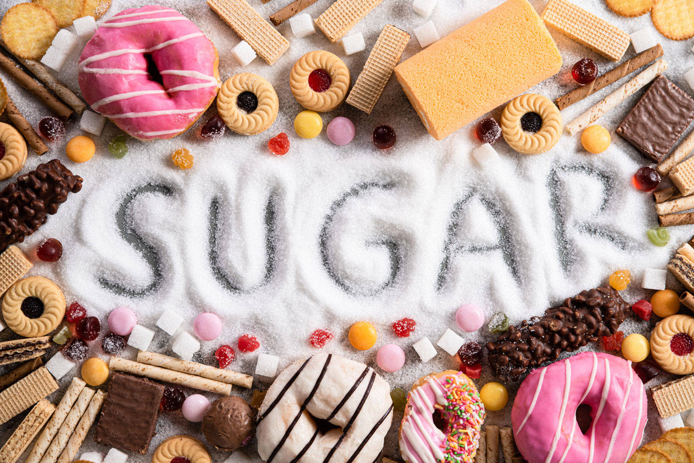 Assorted High-sugar Foods On Display Wallpaper