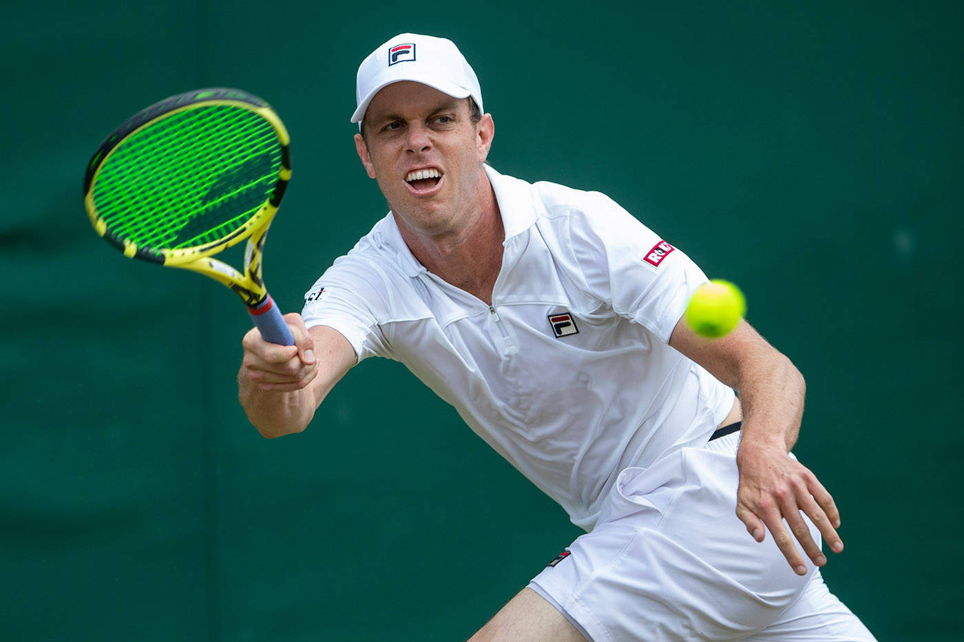 Athlete Sam Querrey Racing To Ball Wallpaper