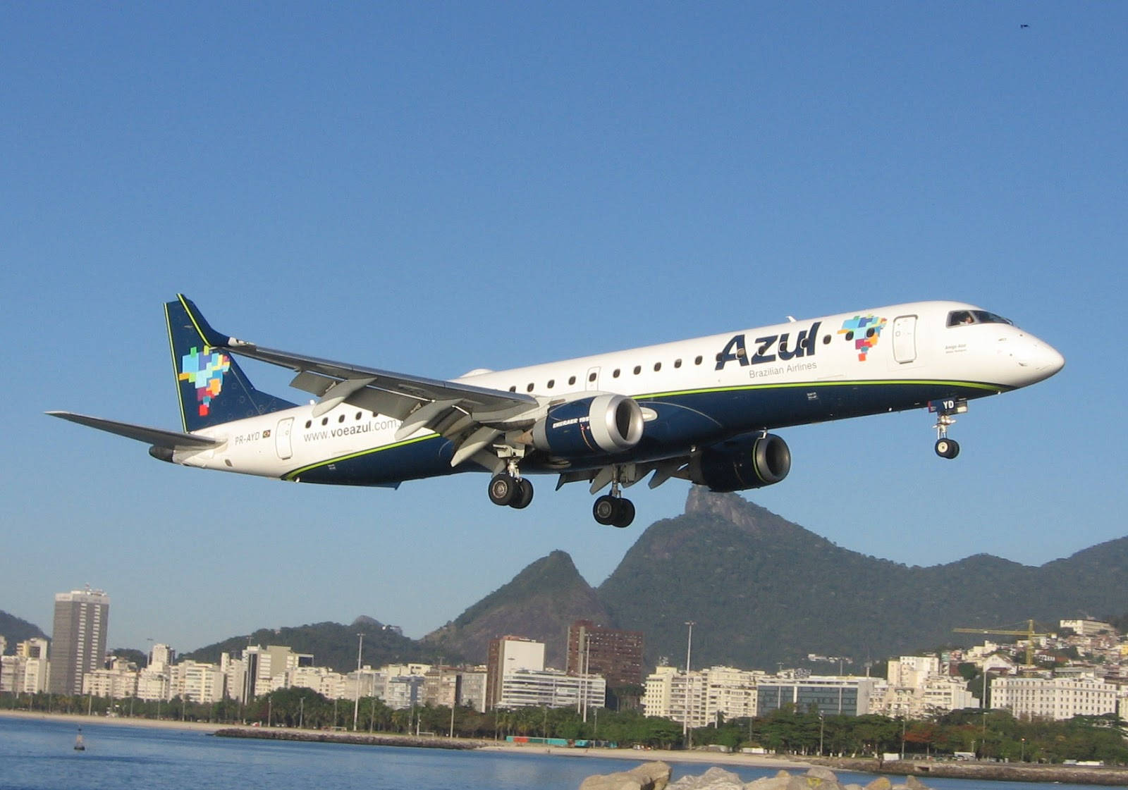 Azul Airlines Aircraft Amidst Stunning Mountainous Landscape Wallpaper