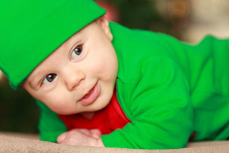 Baby Boy In Green Outfit Wallpaper