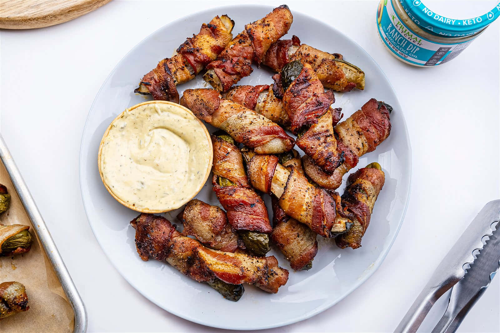 Bacon Wrapped Jalapenos With Dipping Sauce Wallpaper