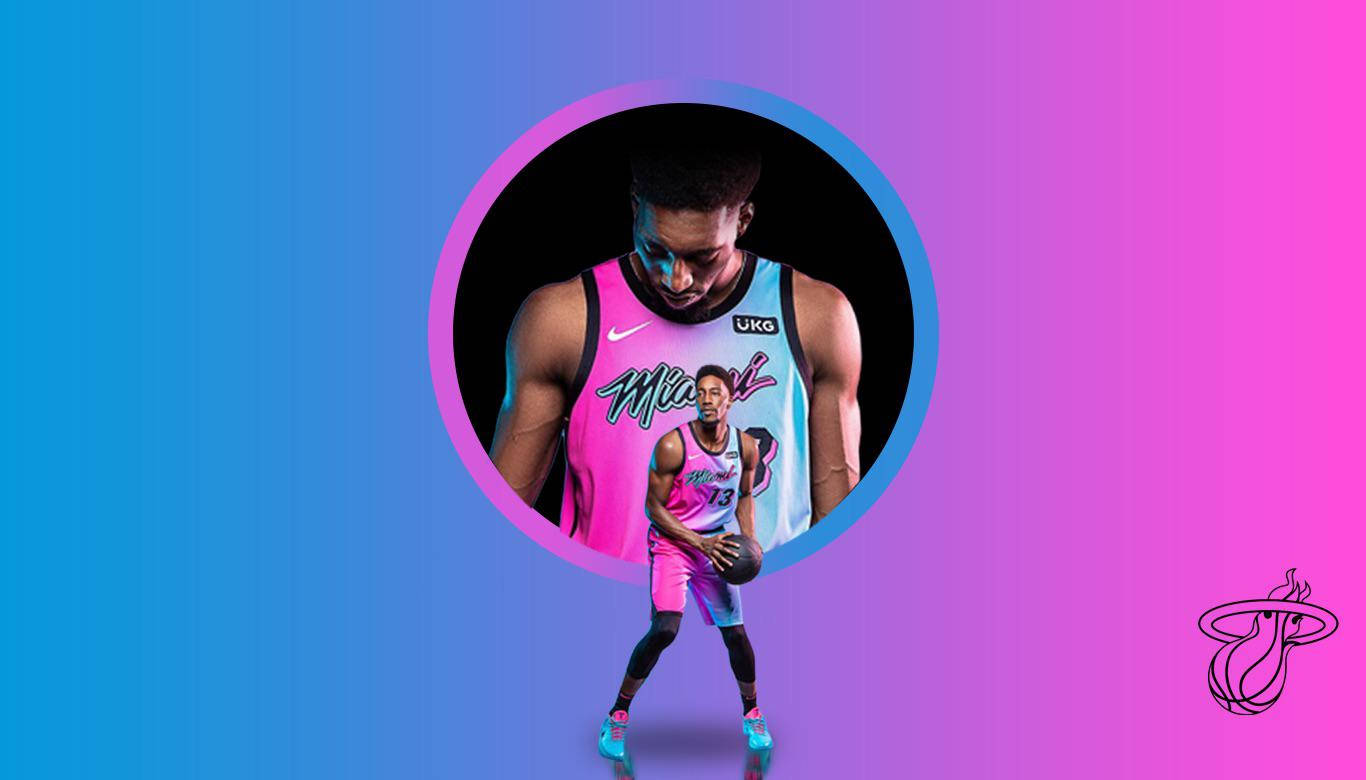 Bam Adebayo In Blue And Pink Wallpaper