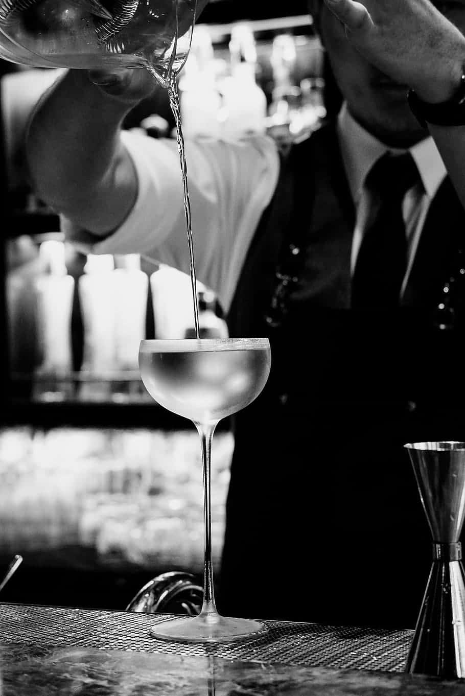 Bartender Pouring Cocktailin Monochrome Wallpaper