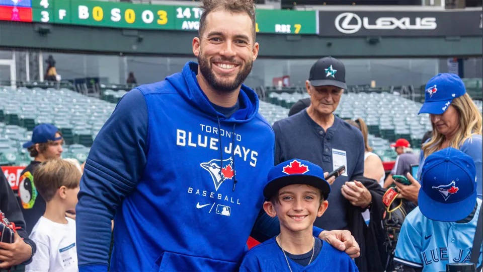 Baseballer George Springer With A Fan Boy Wallpaper