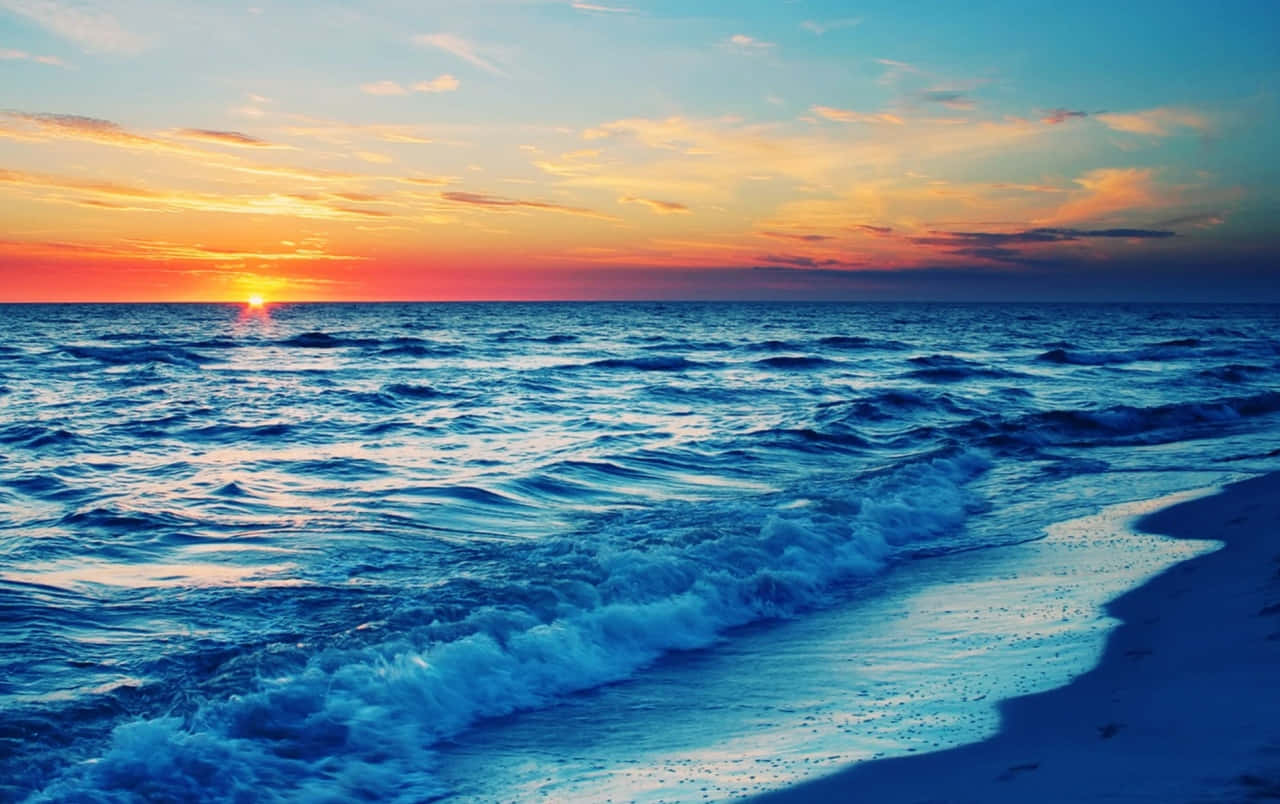 Beach Waves Behind Sunset Hd Wallpaper