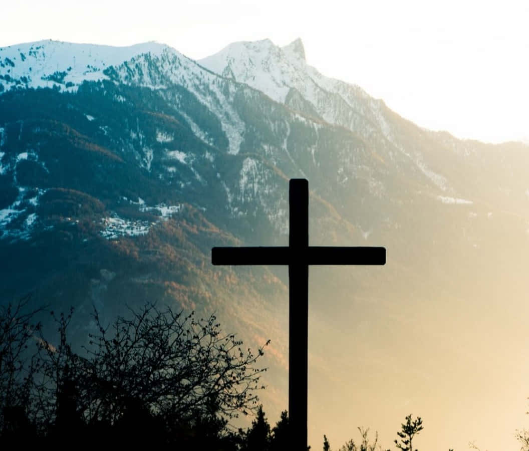 Beautiful Cross Near Snowcapped Mountain Wallpaper