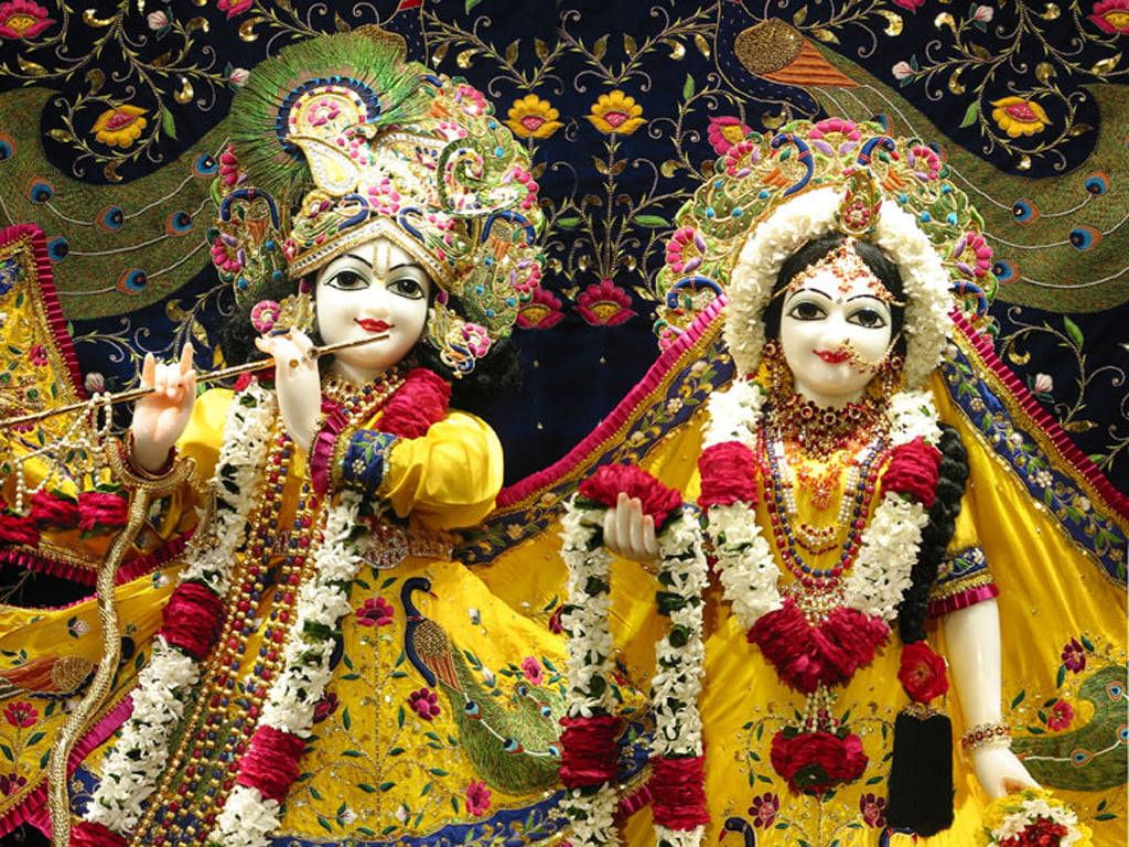 Beautiful Krishna And Radha God Figurines Wallpaper