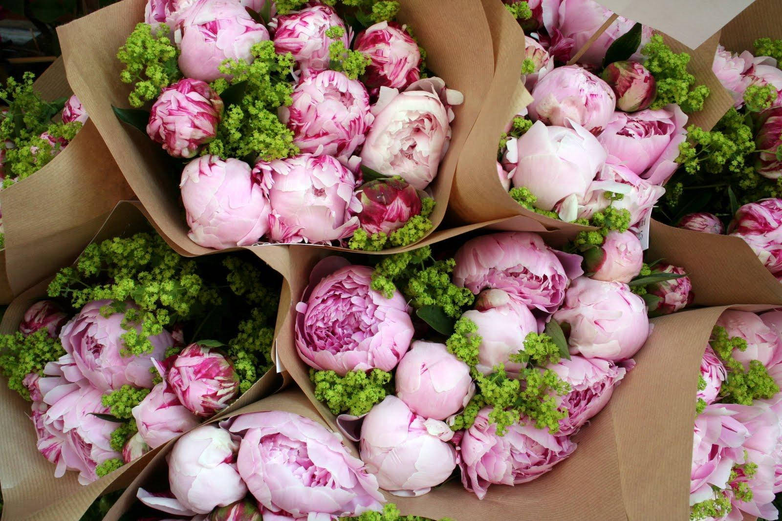 Beautiful Peony Bouquet Wrapped In Brown Paper Wallpaper