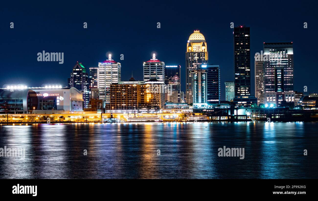 Beautiful Sunset Over The Louisville City Skyline Wallpaper