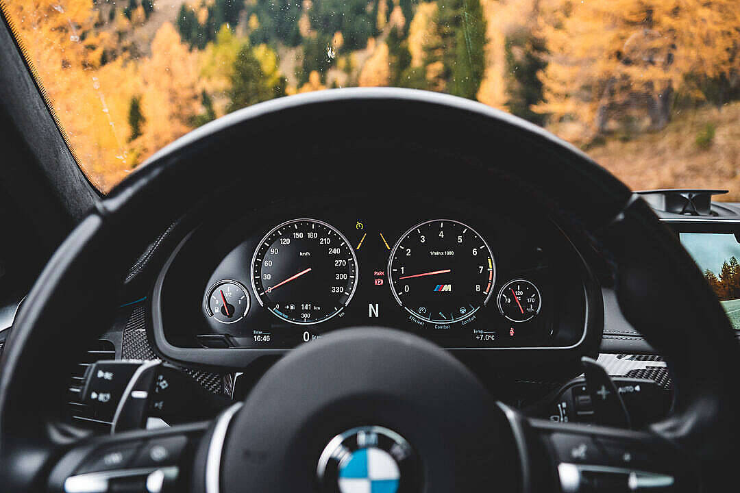 Behind The Wheels Of A Black Bmw Wallpaper
