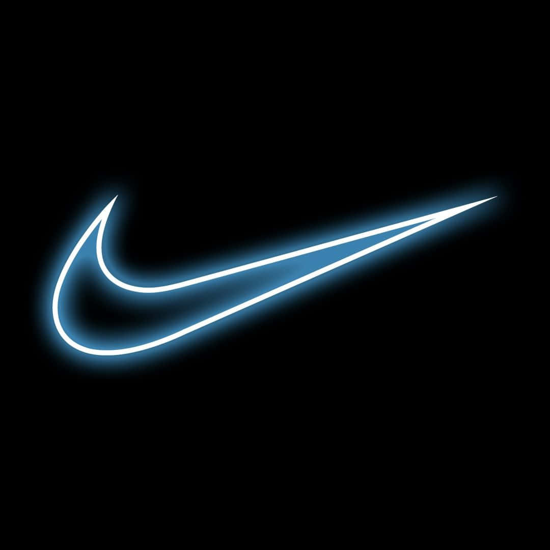 Blue Nike Sneakers In Style Wallpaper