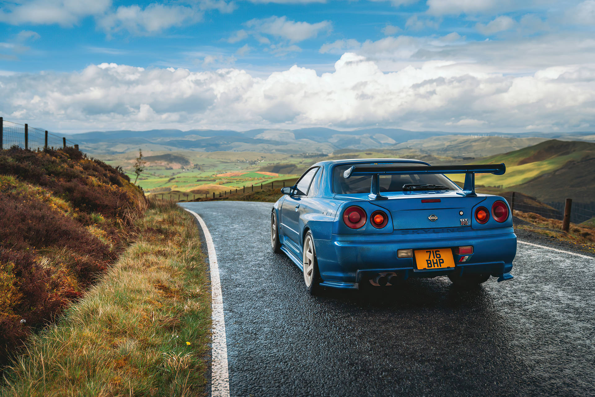 Download free Blue Nissan Skyline Gtr R34 At Hills Wallpaper -  MrWallpaper.com