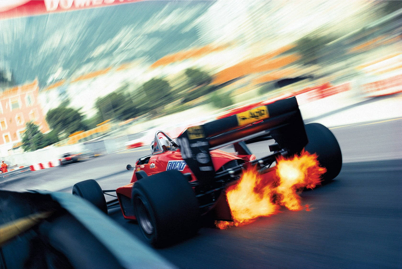 Blurred Photo Of Formula One Fire Car Wallpaper