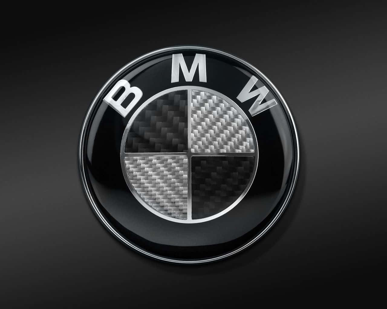 Bmw Logo On A Charcoal Grey Background Wallpaper