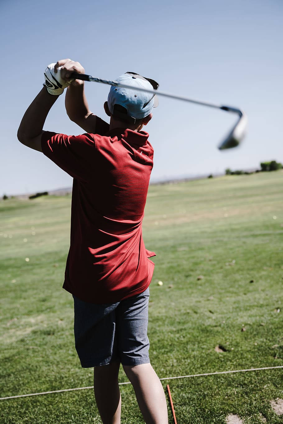 Boy Playing Golf Phone Wallpaper