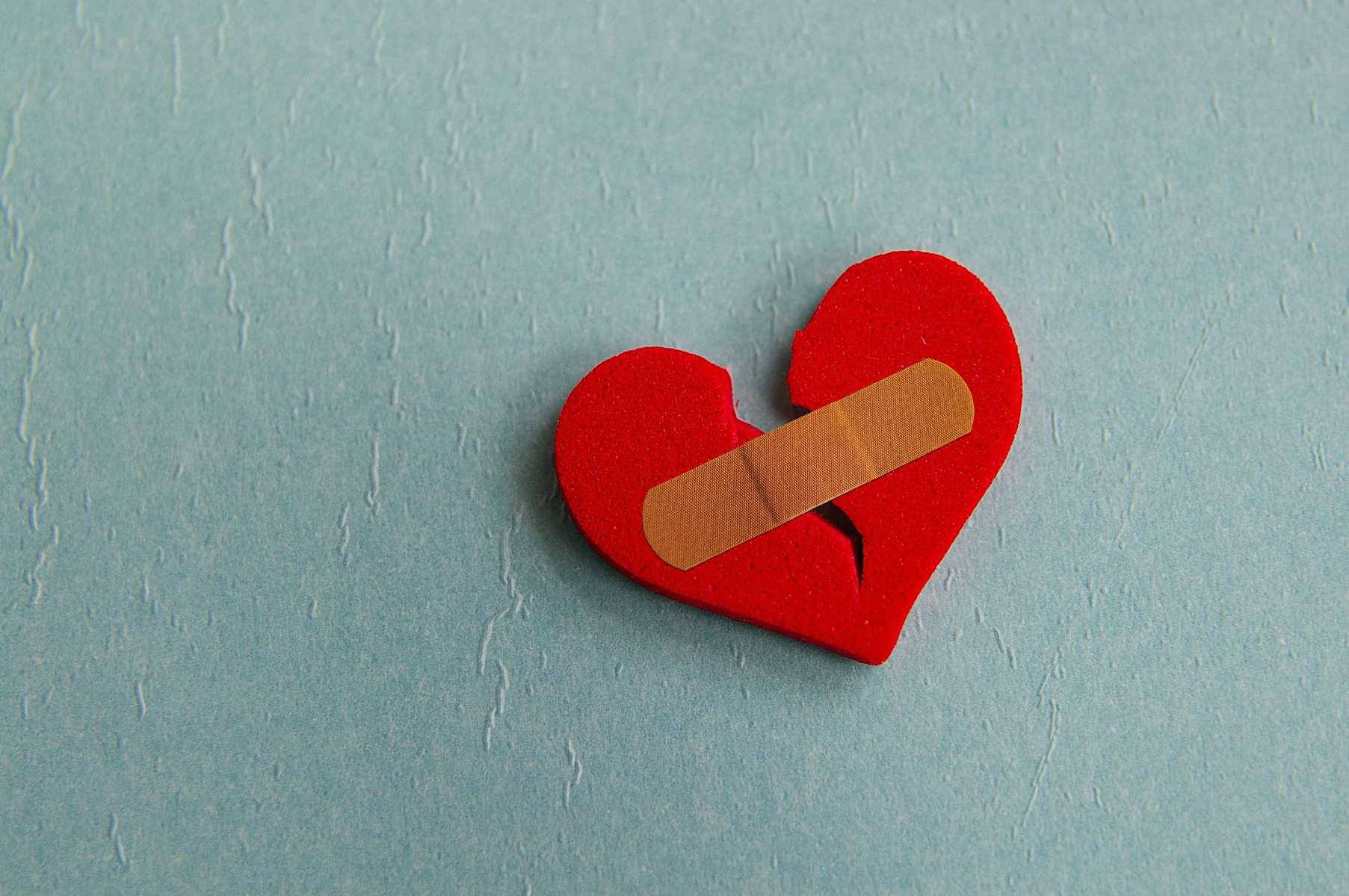 Break Up Band-aid Holding Heart Wallpaper