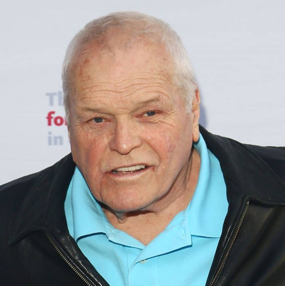 Brian Dennehy In Black And Blue Outfit Wallpaper