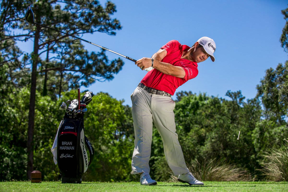 Brian Harman Swinging His Golf Club On A Bright, Sunny Day Wallpaper