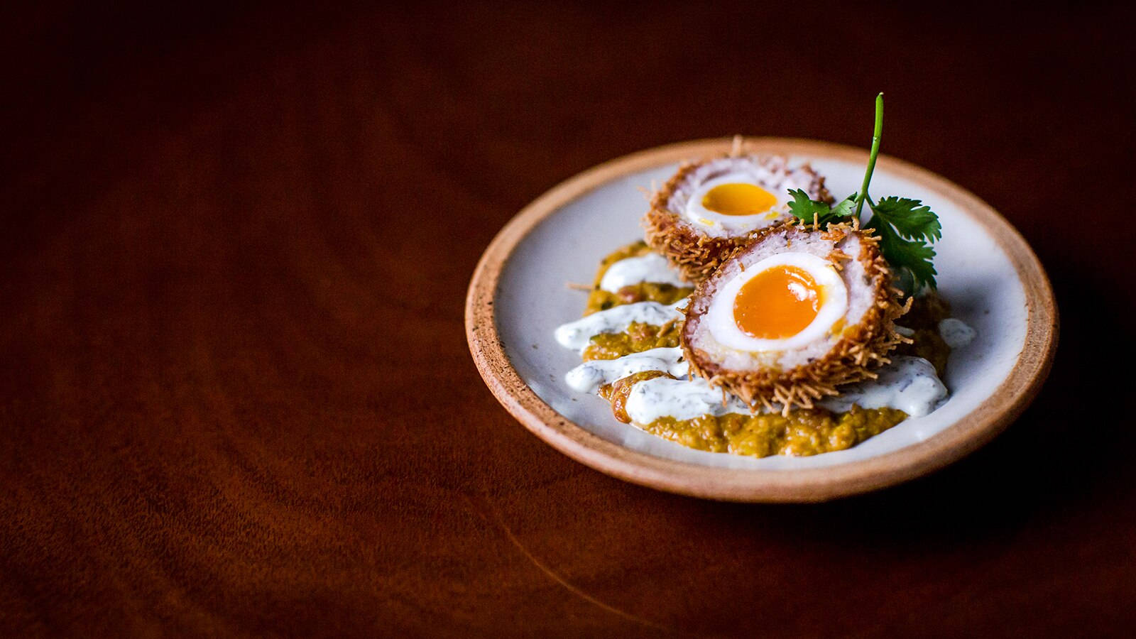 British Scotch Egg Dish With Mustard And Cream Wallpaper