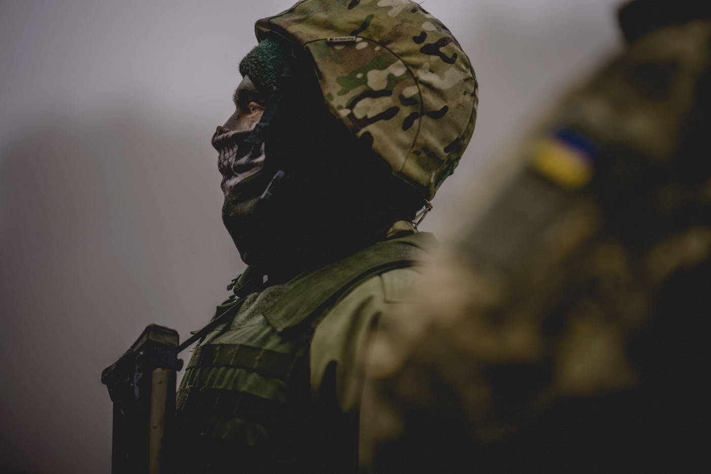 Caption: A British Defense Soldier In Ukrainian Military Uniform Wallpaper